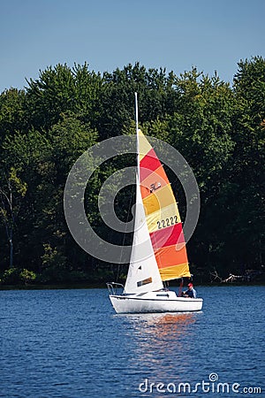 Colorful sailboat in summer on Rend Lake, Illinois Stock Photo