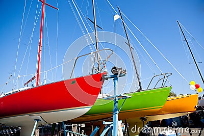 Colorful Sailboats in Dry Dock Stock Photo