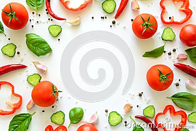 Colorful salad ingredients pattern made of tomatoes, pepper, chili, garlic, cucumber slices and basil on white background Stock Photo