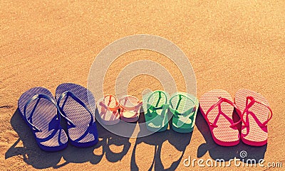 Colorful sandals at the beach Stock Photo