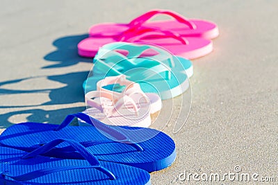 Colorful sandals at the beach Stock Photo