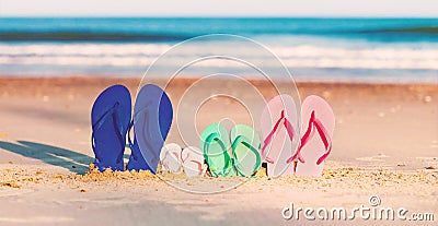 Colorful sandals at the beach Stock Photo