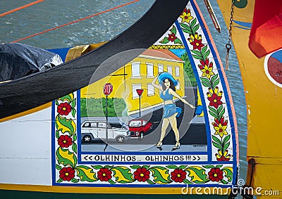 Colorful saucy painting on the front of a moliciero in Aveiro, the Venice of Portugal. Stock Photo