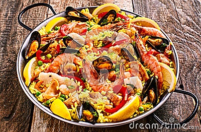 Colorful Seafood Paella Dish with Shellfish Stock Photo