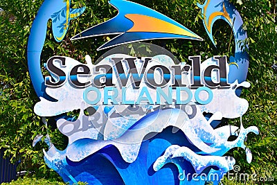 Colorful Seaworld Sign on forest background in International Drive area. Editorial Stock Photo