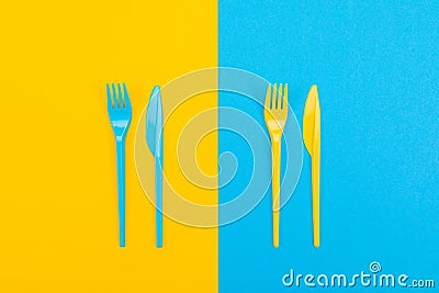 Colorful set of vibrant forks and knife isolated on black Stock Photo