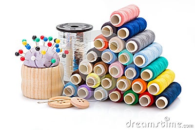 Colorful sewing threads and other sewing accessories Stock Photo