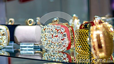 Colorful shiny diamond women handbags in a store Stock Photo