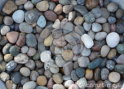 Colorful shiny stones on the ground Stock Photo