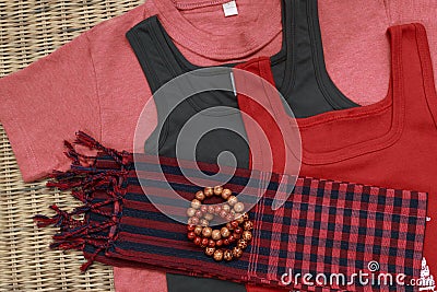 Colorful shirts and traditional khmer scarfs and beads Stock Photo