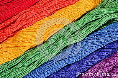 Colorful skeins of floss as background texture Stock Photo