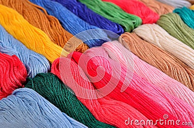 Colorful skeins of floss as background texture Stock Photo