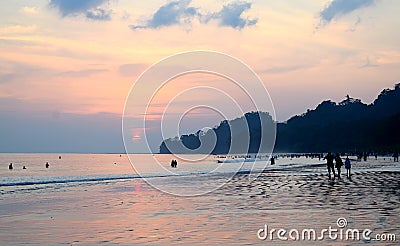 Colorful Sky with Clouds at Evening at Crowded Radhanagar Beach, Havelock Island, Andaman, India Stock Photo