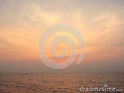 Colorful sky at Dawn at Promenade Beach, Puducherry, India Stock Photo