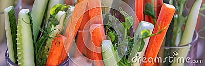 Colorful slices of raw vegetables in glasses: carrots, celery, cucumber, sweet pepper and yogurt sauce. The concept of diet, Stock Photo