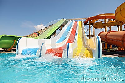 Colorful slides in water park. Summer Stock Photo