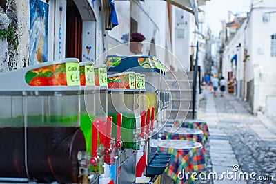 Colorful slushes on display in the historical center of an italian sea town Stock Photo