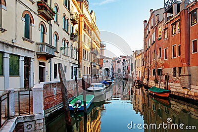 Colorful small canal in Venice Italy Stock Photo