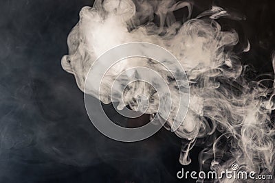 Colorful smoke on a black background of red and white colors. Th Stock Photo