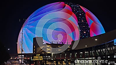 The colorful Sphere at The Venetian Resort surrounded by buildings at night in Las Vegas Nevada Editorial Stock Photo