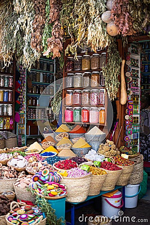 Colorful spices in different recipients on a spices market in Marrakesh, Morocco Stock Photo