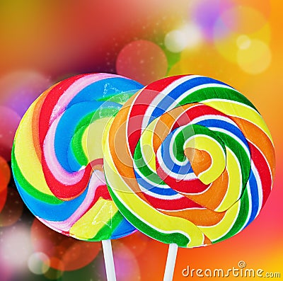 Colorful spiral lollipop isolated on a colored Stock Photo