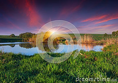 Colorful spring landscape on fishing pond. Stock Photo