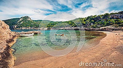 Colorful spring panorama on the cozy beach in northeastern Corinthia, Greece. Sunny outdoor scene of the Greek resort. Beauty of n Stock Photo