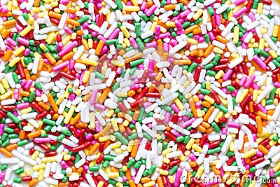 Colorful sprinkles, jimmies for cake or ice cream to Stock Photo