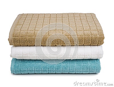 Colorful stacked bath towels isolated on white background Stock Photo