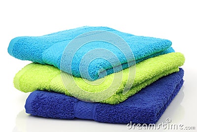 Colorful stacked bathroom towels Stock Photo