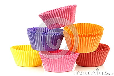 Colorful stacked empty muffin cups Stock Photo