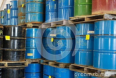 Colorful stacked steel barrels Stock Photo