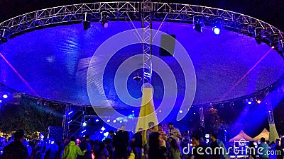 Colorful stages and light show at an electronic music festival in Madrid Editorial Stock Photo