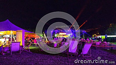 Colorful stages and light show at an electronic music festival in Madrid Editorial Stock Photo