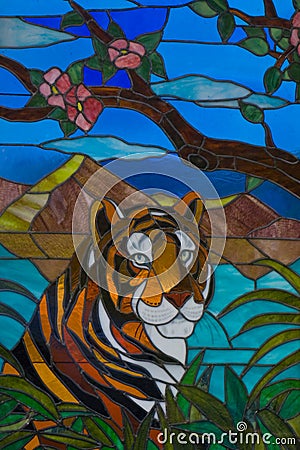 Colorful stained glass depicting a tiger Stock Photo