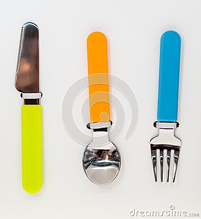 Colorful stainless spoon, fork and knife Stock Photo