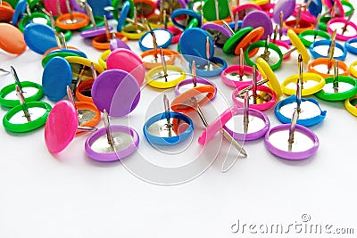 Colorful stationary, back to school, office, business and education concept. School and office supplies paper clips, pins on white Stock Photo