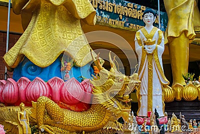 Colorful statues in interior and exterior of buddhist temple Wat in Thailand Editorial Stock Photo