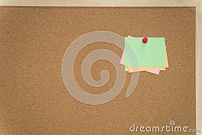 Colorful sticky notes on cork bulletin board Stock Photo