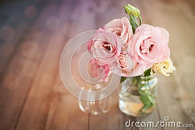 Colorful still life with roses in glass vase Stock Photo