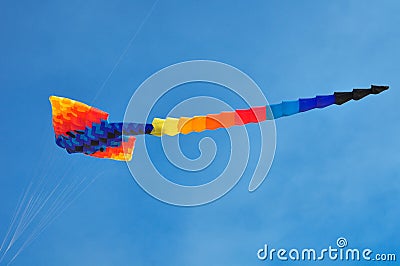 Colorful Stingray fancy kite flying in the blue sky. Stock Photo