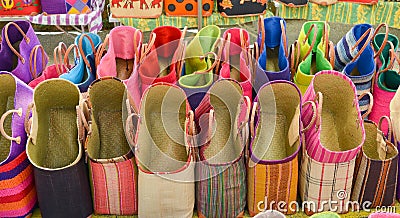 Colorful straw bags at a market in Provence,France Souvenirs Stock Photo