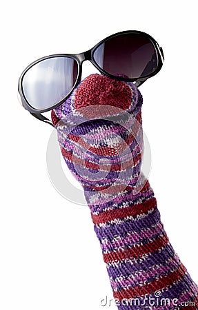 Colorful striped sock puppet with sunglasses Stock Photo