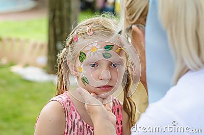 Colorful summer face painting Stock Photo
