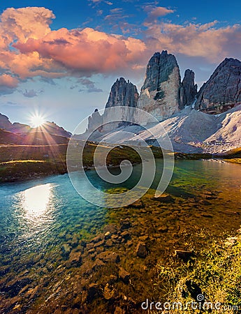 Colorful summer sunrise on the lake Rienza Stock Photo