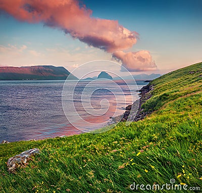 Colorful summer view of Hestur Island. Impressive sunrise on outskirts of Kirkjubour village, Faroe Islands, Kingdom of Denmark, E Stock Photo