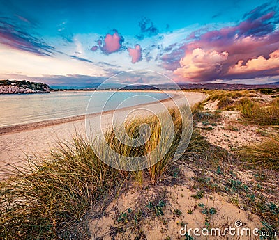 Colorful summer view of Voidokilia beach. Dramatic sunset on the Ionian Sea, Pilos town location, Greece, Europe. Beauty of nature Stock Photo