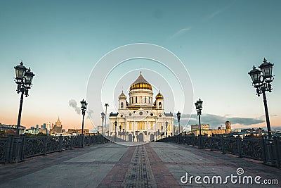 Colorful sunrise over the Cathedral of Christ the Savior. Cityscape with a view on orthodox temple from the bridge Patriarshiy Editorial Stock Photo