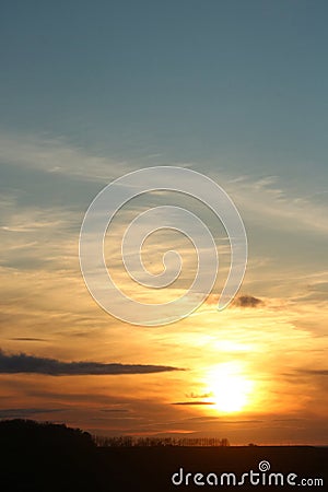 Colorful sunset, interesting cloud formations Stock Photo